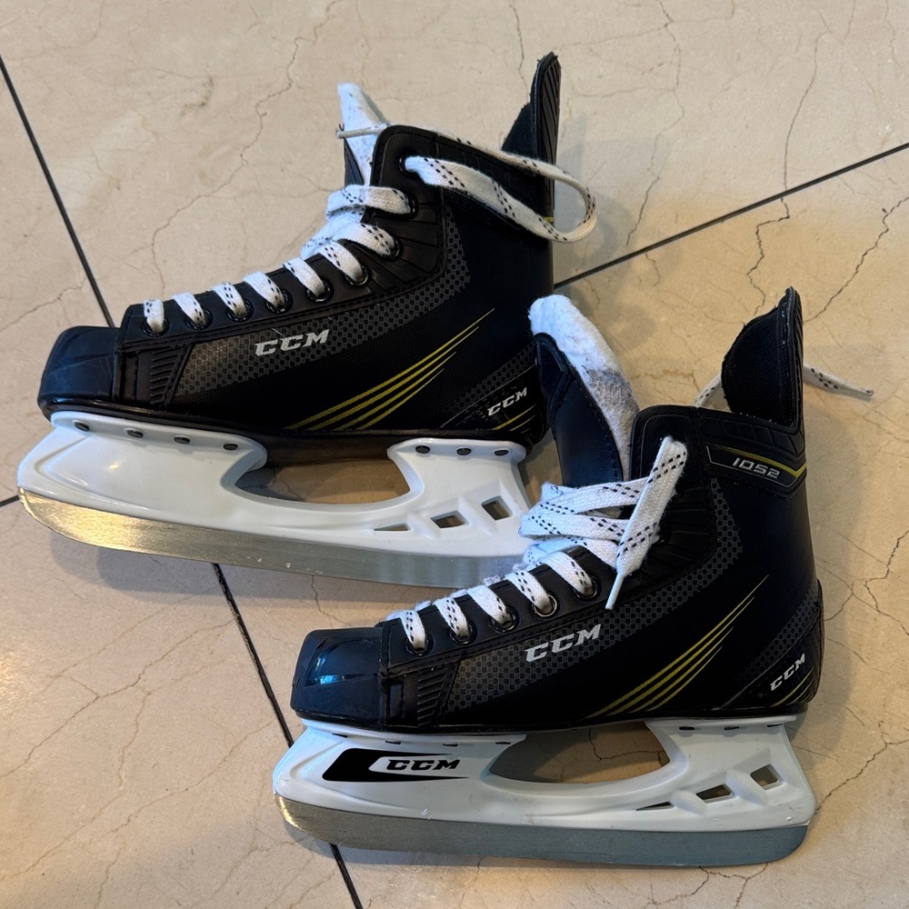 CCM Black and White Hockey Skates with Yellow Accents